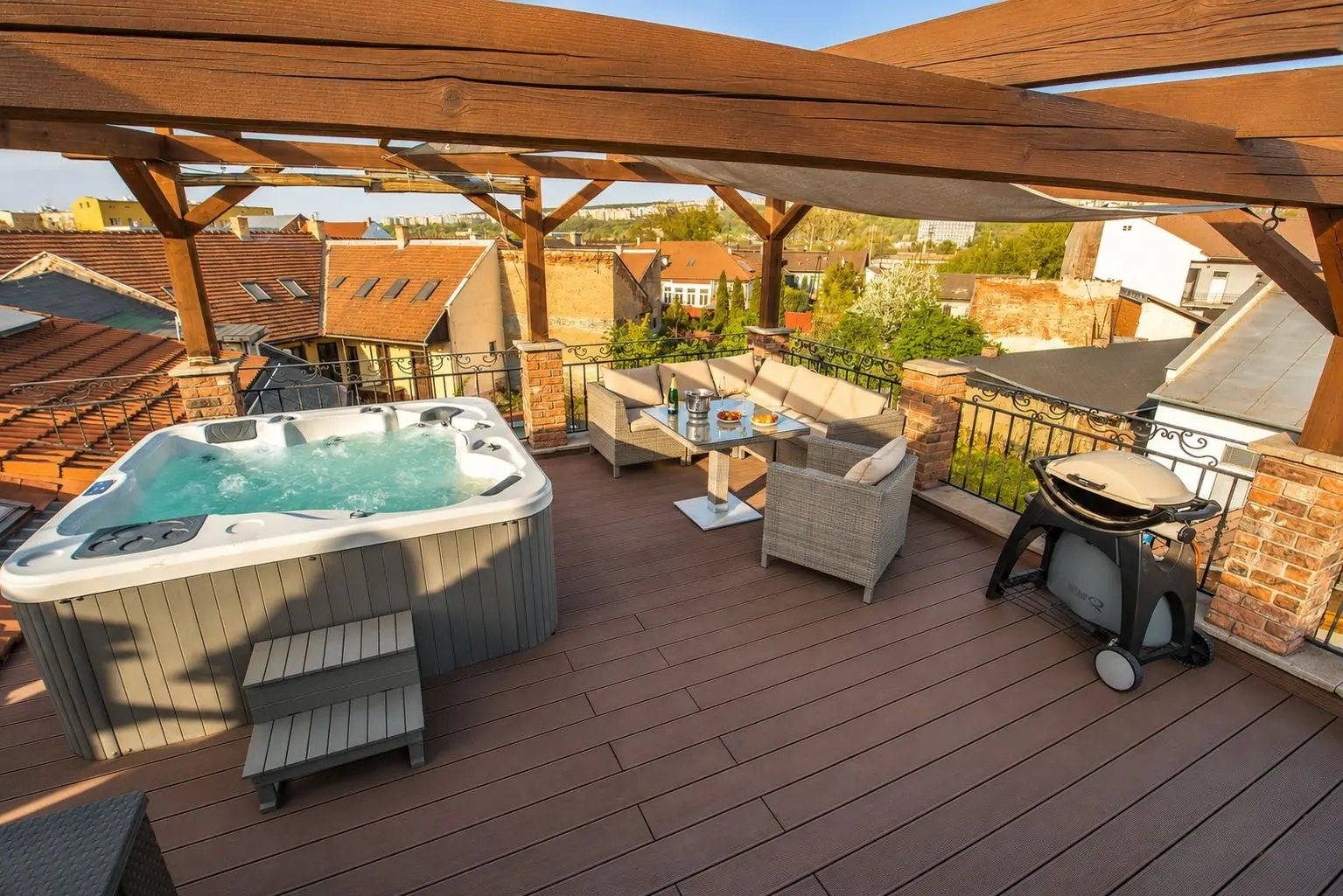 Private rooftop terrace with jacuzzi and BBQ area in Košice apartment